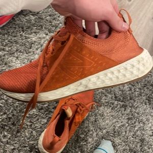 Size 12 orange New Balance running shoes